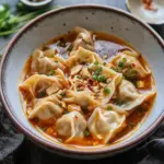 Delicious Tofu and Chive Wontons in Spicy Chili Broth 6 Tofu and Chive Wontons in Chili Broth