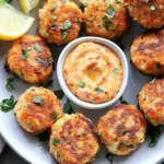 Crispy Mini Salmon Cakes with Sriracha Lemon Aioli Delight 2 Mini Salmon Cakes with Sriracha Lemon Aioli